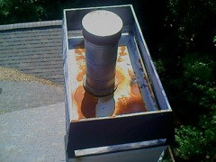 Woodstock's Best Gutter Cleaners' Certainteed Certified roofers can install or replace your custom chimney pan.